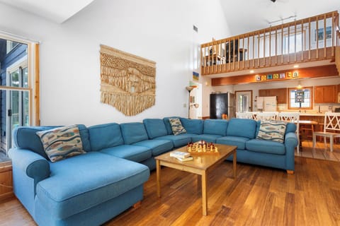 Relax in the open-air Living Area with Flat Screen TV for family movie night.