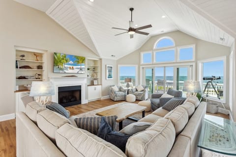 Relax in the spacious Living Area with massive windows and lots of natural light.