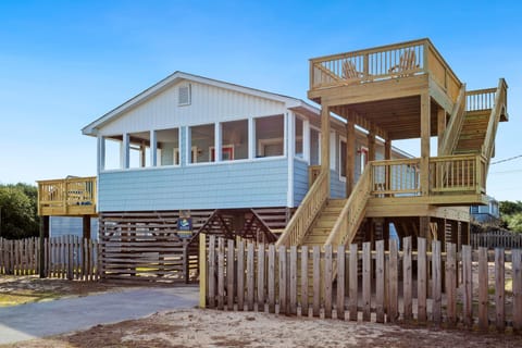 This 4-Bedroom, 3-Bathroom oceanside residence in the heart of Kitty Hawk is a dog-friendly vacation rental home that welcomes your four-legged friends to accompany you on your escape to this island paradise.