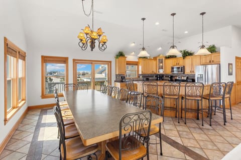 Eat together in the spacious Dining Area with lots of natural light and high ceilings.