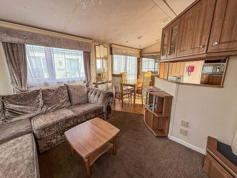 Cozy living room with plush seating and natural light