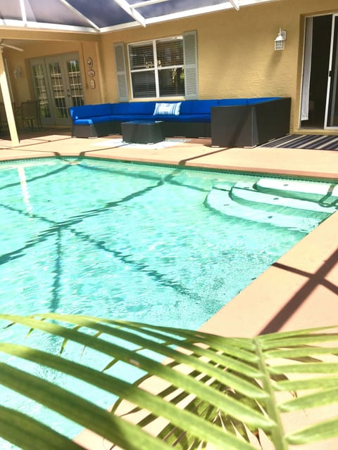 Large outdoor sitting area with outdoor dining area as well