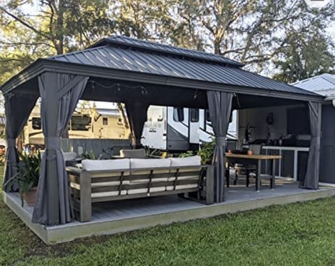 Gazebos are up! Heavy and light screen curtains as needed. *Stock Photo*