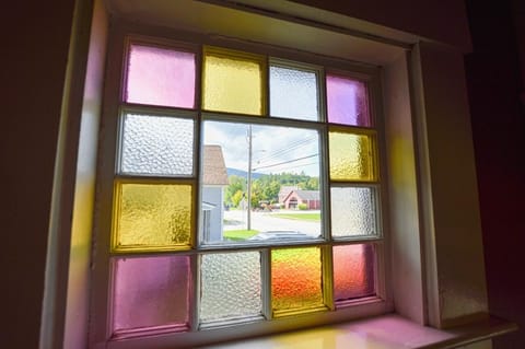 Original stained glass window over staircase