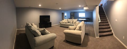 Downstairs living area - 2 couches pull out into queen beds
