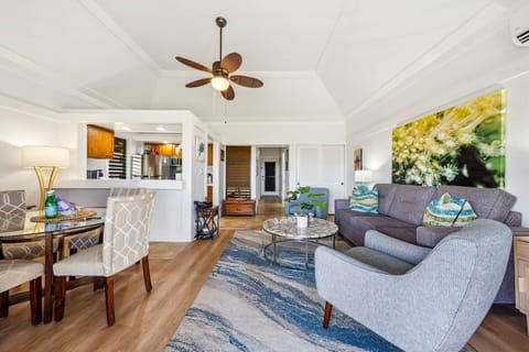 This cozy living space features a stylish area rug that complements the modern decor beautifully.