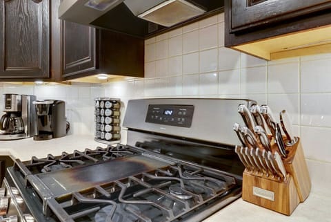 Cook with ease using quality cookware, gas range, and thoughtful details that elevate your stay with A Stay Above The Rest.