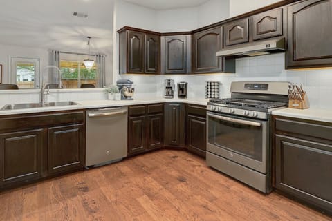 Fully equipped kitchen for home-cooked meals in your Austin vacation rental.