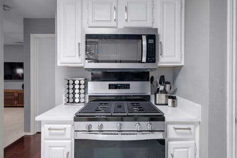 Fully equipped kitchen designed for longer stays, featuring modern finishes, ample storage, and natural light.