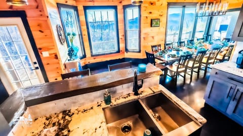 Dining Room: Panoramic views and seating for 16, perfect for unforgettable gatherings!