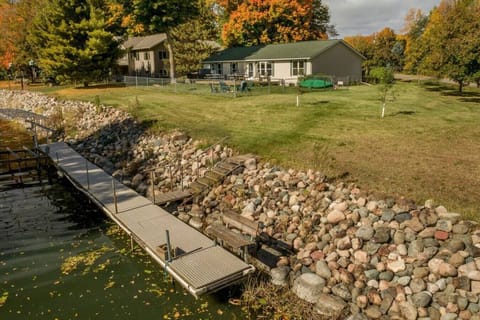 Lakeside cabin with 44` boat dock and fenced yard