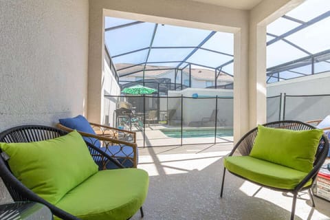 Enjoy a covered patio with seating for 4.