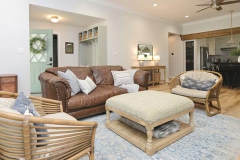 There is plenty of seating around the tv.