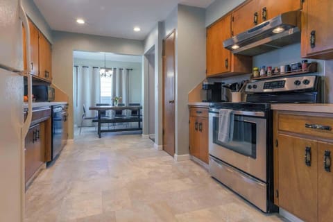 full kitchen area leading to the dining room