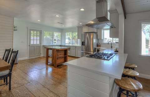 Kitchen with counter stools