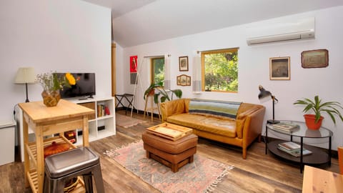 Living room with cozy Restoration Hardware Leather couch