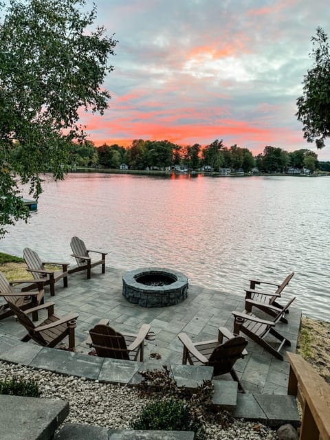 Nestled along the shoreline, this cozy spot invites you to unwind and connect with loved ones while enjoying the warmth and ambiance of a crackling fire. 