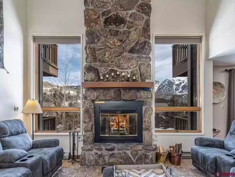 Living room is a perfect place to relax with family and friends with wood fire.