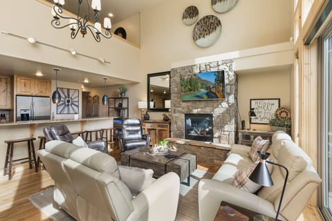 Main Living Space and Kitchen - Gas Fireplace, TV and deck access