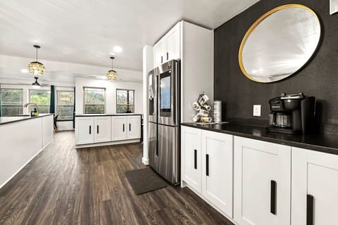 Our kitchen is fully stocked with everything you'll need, including a Samsung Smart Fridge, Keurig coffee maker and Monogram stove.