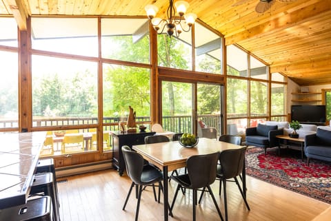 Open plan living and dining area with stunning views of Basshaunt Lake.