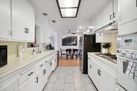 "Fully stocked kitchen with all the essentials, making it easy to cook your favorite meals during your stay."