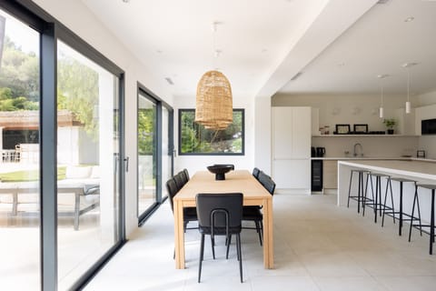 Dining Room with direct access to pool and garden