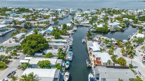 Aerial view of home.  Bay is a 5mins boat drive. Amazing sunsets 