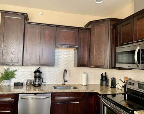 Delight in the culinary experience as you whip up delicious dishes in a space that combines aesthetics, convenience, and efficiency.