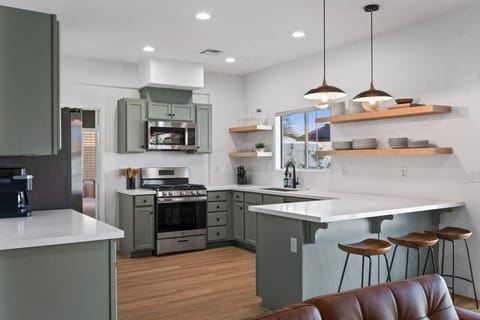 Kitchen space with 3 counter height bar stools