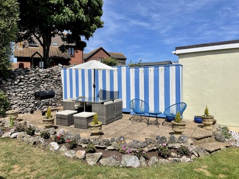 Secure & Private Back Garden with lots of seating & BBQ. A Perfect sun trap