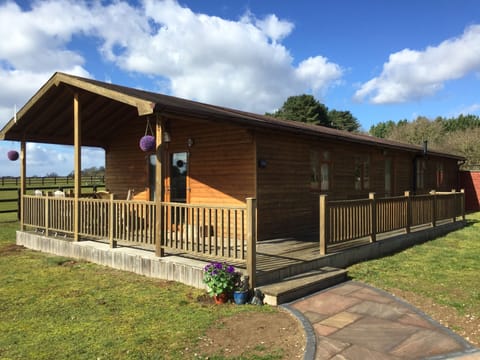 Step up to the veranda and walkway to the front door.