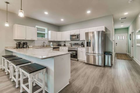 Fully Stocked kitchen with stainless appliances