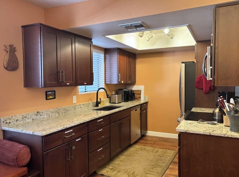Newly re-modeled kitchen with granite counters
