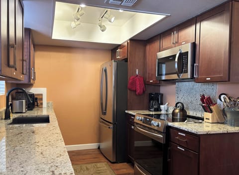 Newly re-modeled kitchen with granite counters