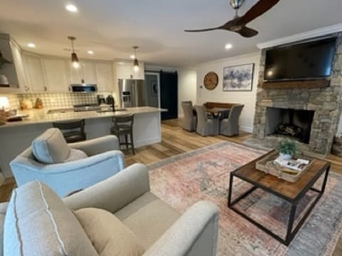Living room, dining area and kitchen