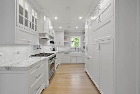 Pristine Kitchen, fully appointed with double thick Honed Marble.