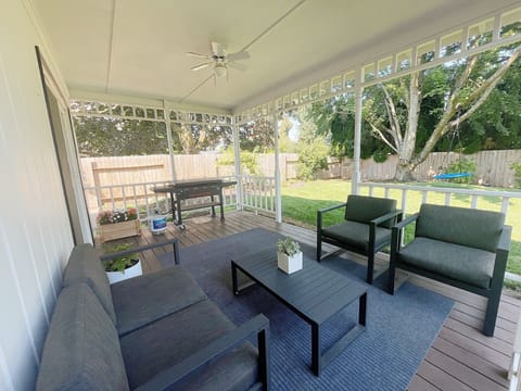 Covered Patio with BBQ & lounge patio furniture 