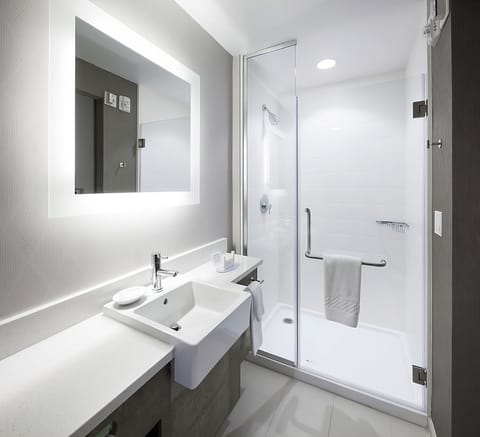 Full bathroom with a shower. Basic toiletries and towels are provided