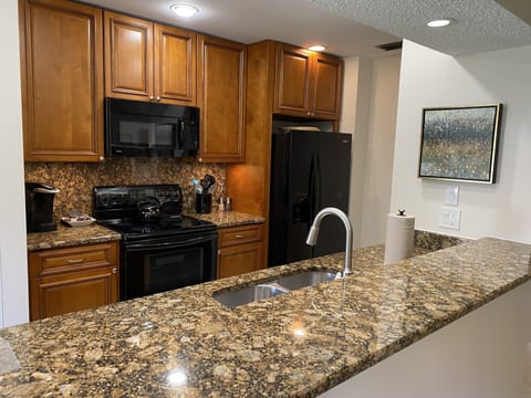 Updated kitchen with beautiful countertops