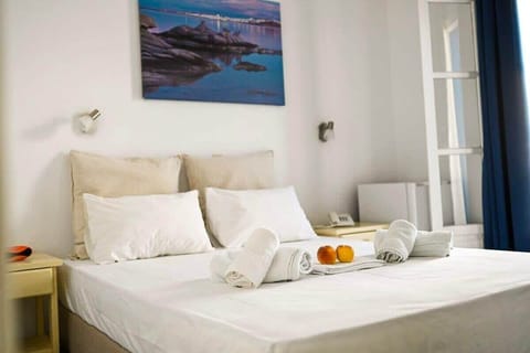 Rest and recharge in a bright, cozy bedroom, thoughtfully furnished to offer a peaceful retreat after days spent exploring or relaxing in the sun.