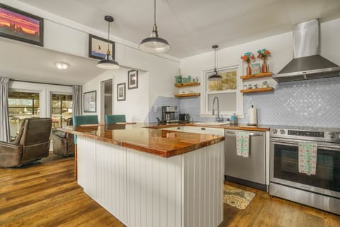 Kitchen is well stocked kitchen for all your cooking and eating enjoyment.