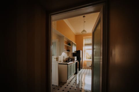 The bright kitchen attaches to the dining room, perfect for mealtime