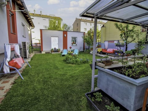 Plant, Property, Building, Sky, Grass, Architecture, Land Lot, Chair, Cloud, Shade