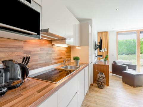 Cabinetry, Countertop, Furniture, Kitchen, Wood, Kitchen Appliance, Plant, Home Appliance, Flooring, Kitchen Stove