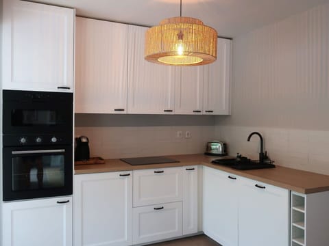 Cabinetry, Countertop, Kitchen Sink, Property, Furniture, Sink, Kitchen, Building, Wood, Lighting