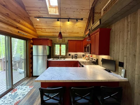 View of the new kitchen and island peninsula. Fully stocked kitchen