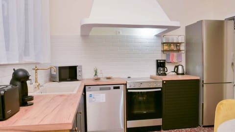 Kitchen with essentials and appliances