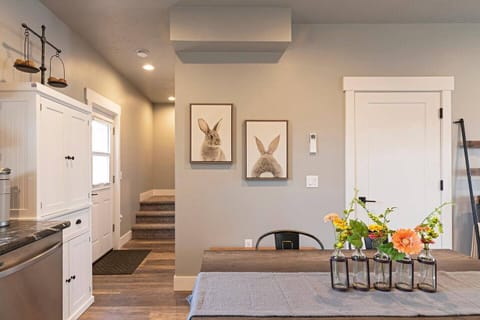 dining area and stairs leading to all 3 bedrooms