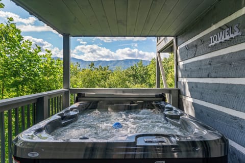 Private hot tub with mountain backdrop